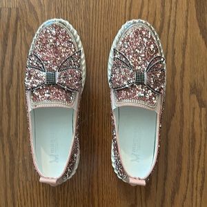 Perfect Slip-On Sneakers. Shiny rhinestone upper w/cute bow & superior comfort.